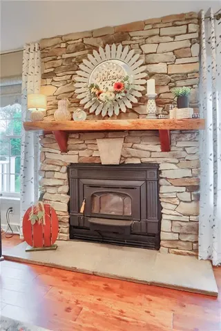 a fireplace with a wooden floor
