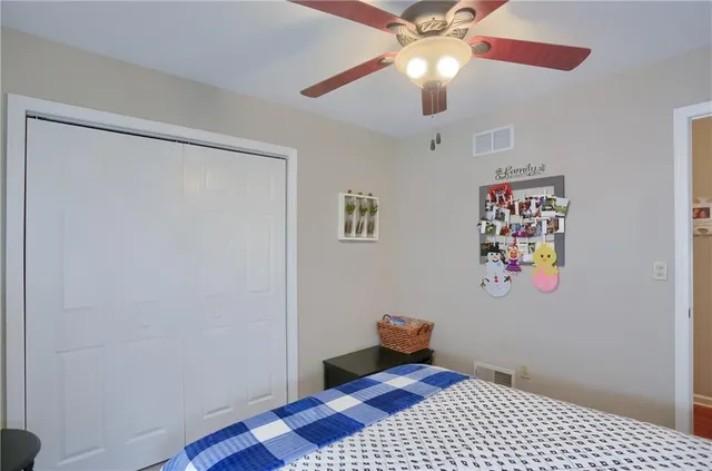 a bedroom with furniture and a window