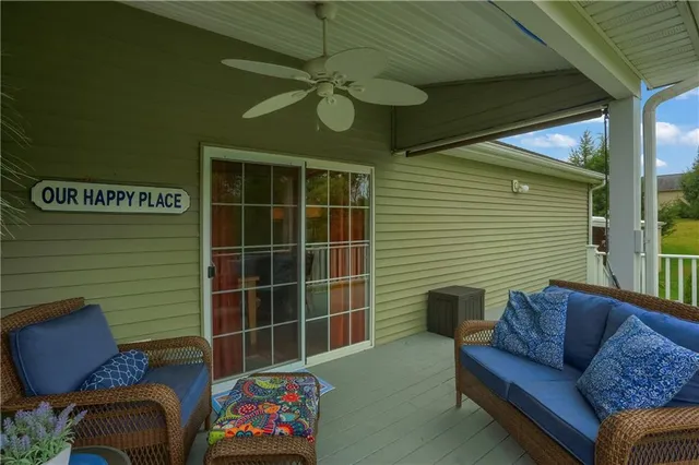 a backyard of a house with seating space