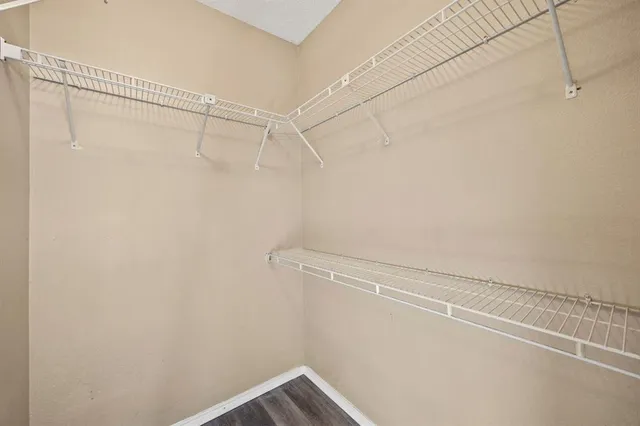 a view of a room with racks on the wall
