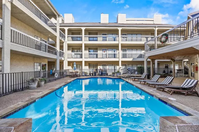 a view of a building with a swimming pool