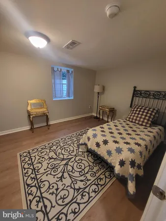 a room with furniture and air hockey table