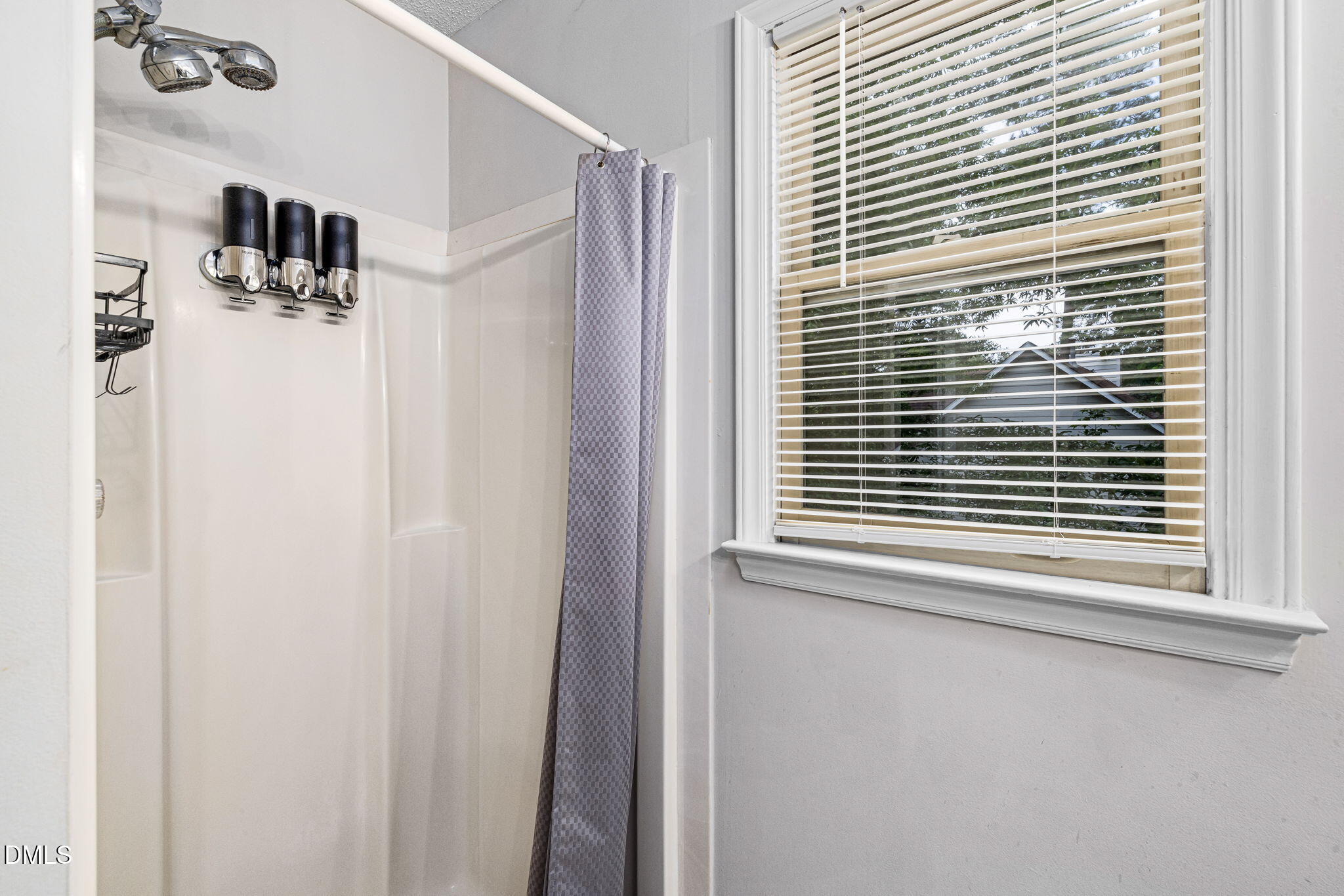 403 Chadbourne Drive Durham, NC 27703 - Photo 24 of 30 a view of a window and a bathroom