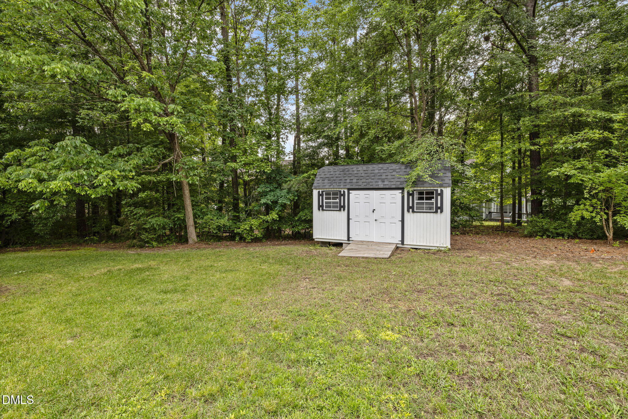 403 Chadbourne Drive Durham, NC 27703 - Photo 30 of 30 a house is sitting in middle of green field