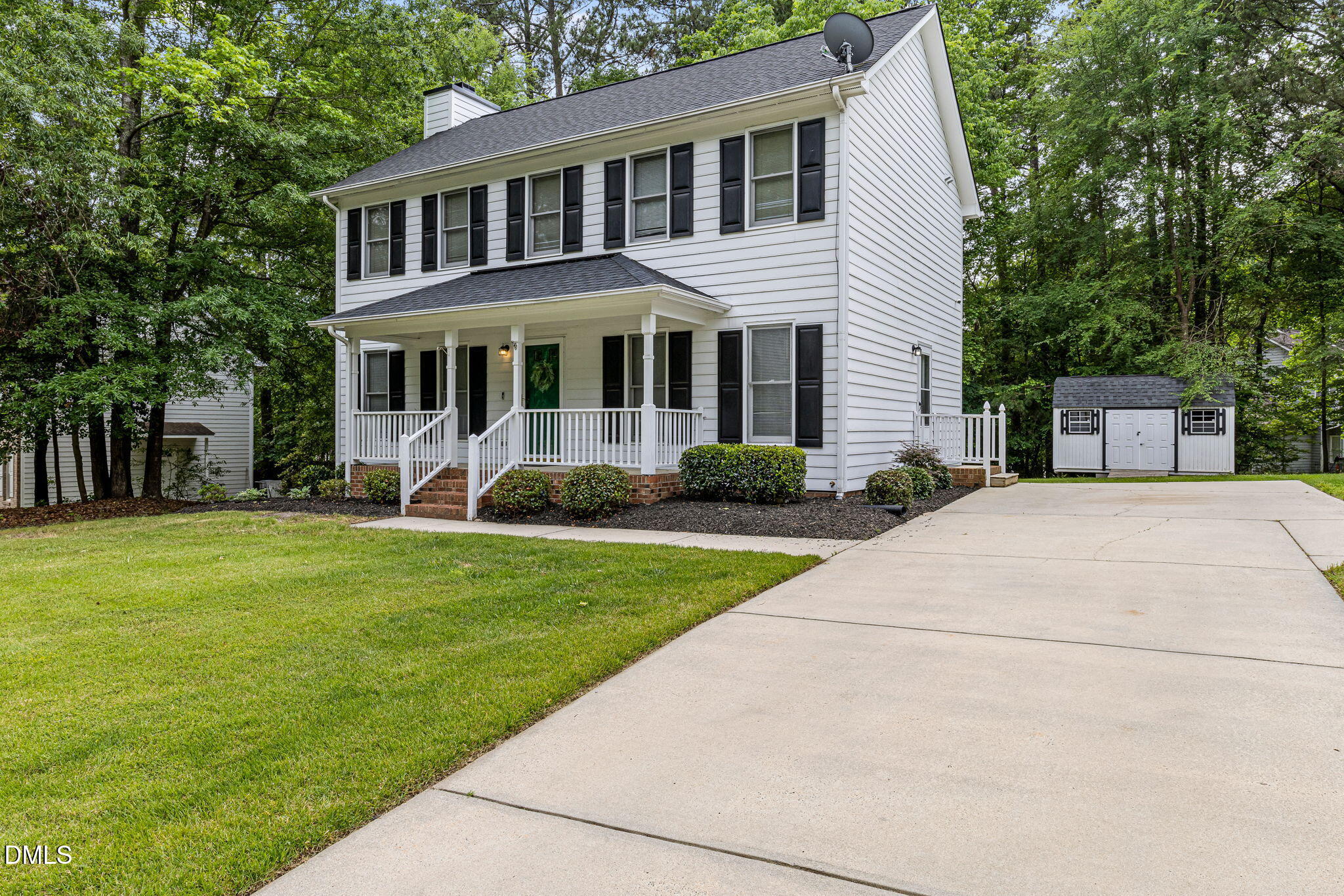 403 Chadbourne Drive Durham, NC 27703 - Photo 4 of 30 a front view of a house with a yard