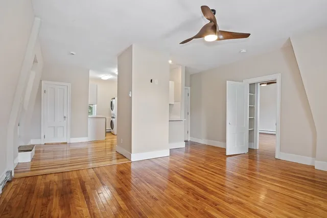 a view of a livingroom with wooden floor