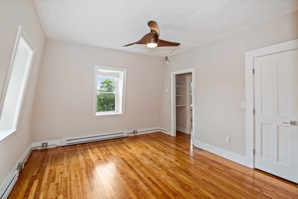 35 Oak Avenue, Unit 3 Worcester, MA 01605 - Photo 11 of 24 a view of empty room with wooden floor and fan