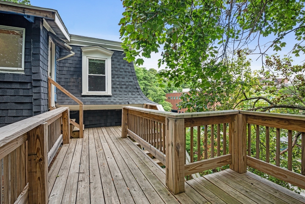 35 Oak Avenue, Unit 3 Worcester, MA 01605 - Photo 18 of 24 a view of balcony with wooden floor and fence