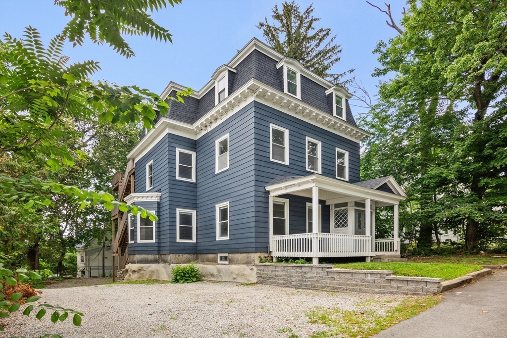 35 Oak Avenue, Unit 3 Worcester, MA 01605 - Photo 20 of 24 a front view of a house with a yard