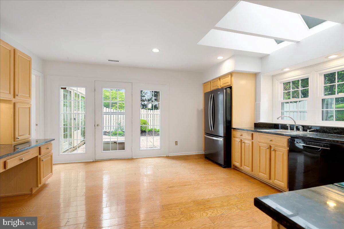 102 Quail Lane Wayne, PA 19087 - Photo 13 of 41 Kitchen opens to enclosed patio