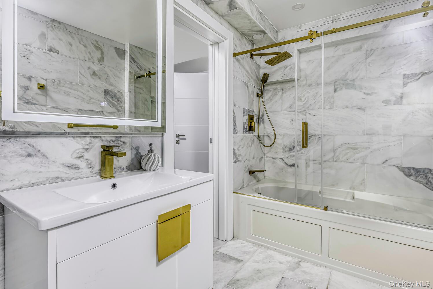 4 Cortland Road Monsey, NY 10952 - Photo 21 of 29 a bathroom with a bathtub and a shower