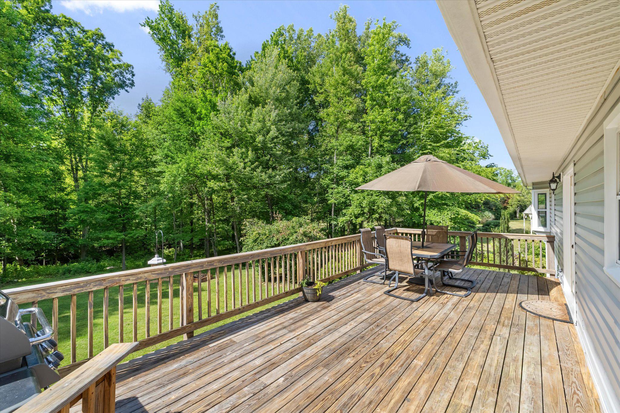 230 Richards Ferry Road Fredericksburg, VA 22406 - Photo 55 of 96 Serene deck overlooking lush greenery.