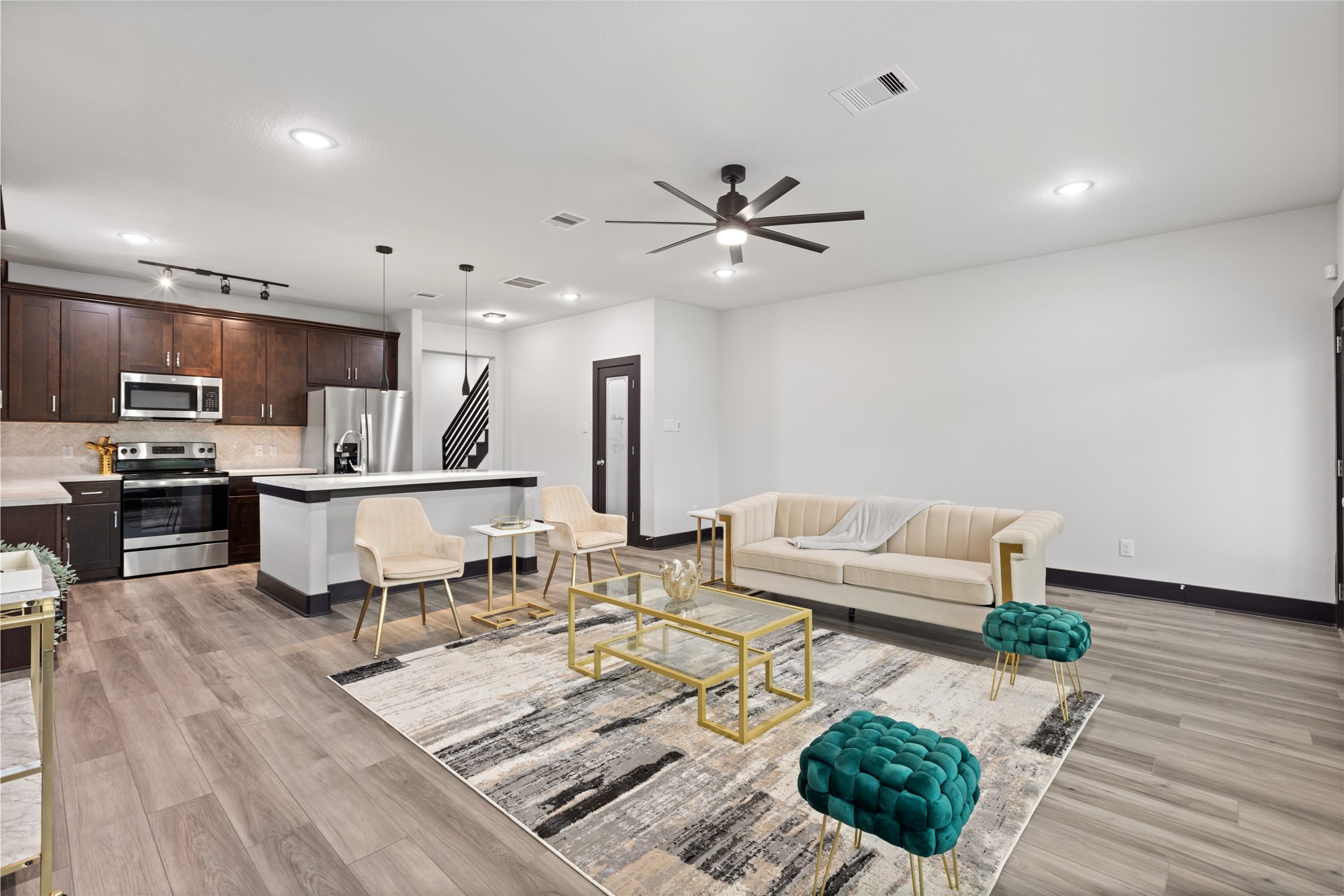 4435 Maggie Street, Unit B Houston, TX 77051 - Photo 13 of 37 a living room with stainless steel appliances furniture and a kitchen view