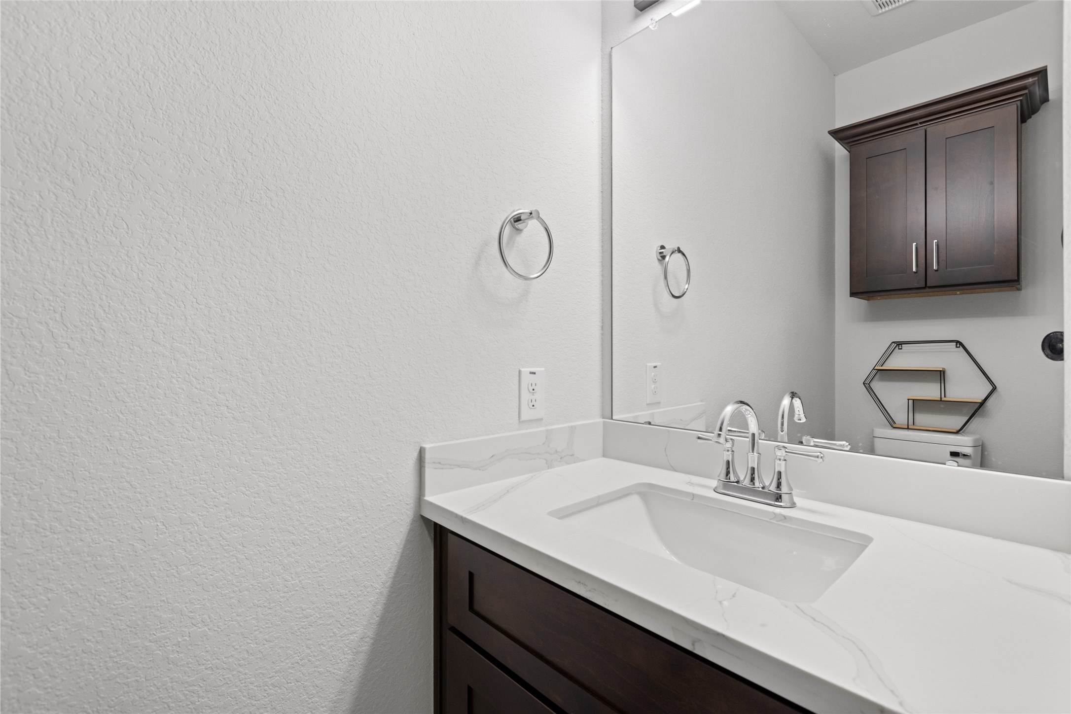 4435 Maggie Street, Unit B Houston, TX 77051 - Photo 14 of 37 a bathroom with a sink and a mirror