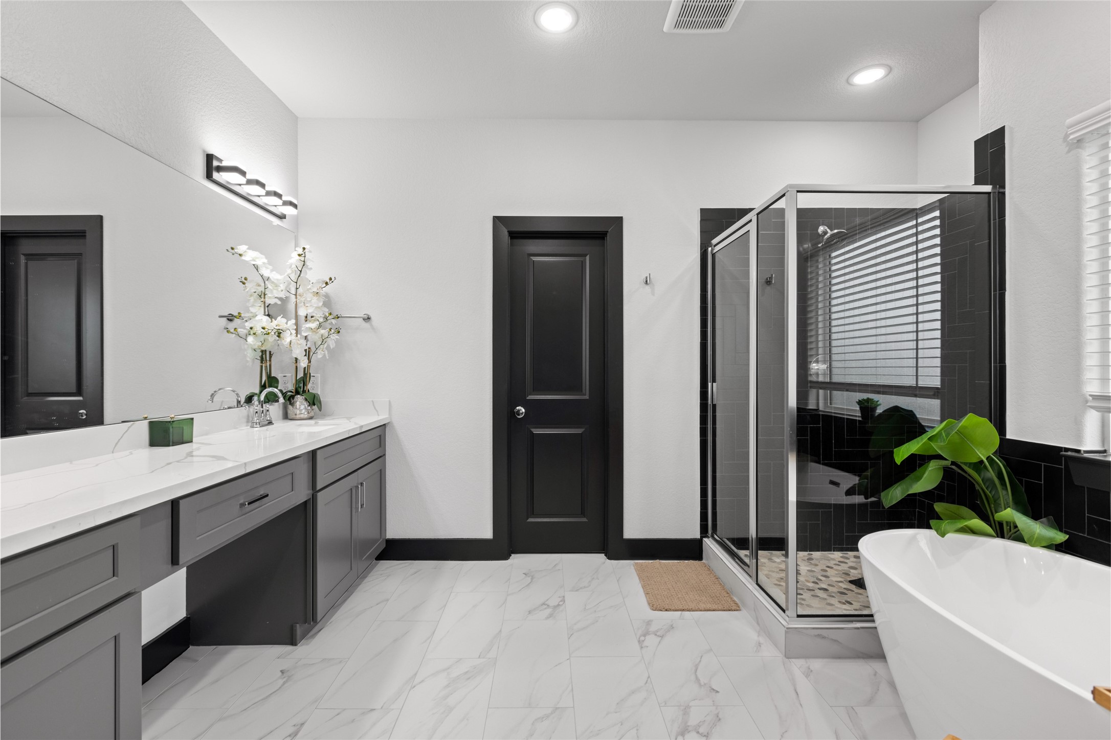 4435 Maggie Street, Unit B Houston, TX 77051 - Photo 17 of 37 a bathroom with a sink a toilet and shower