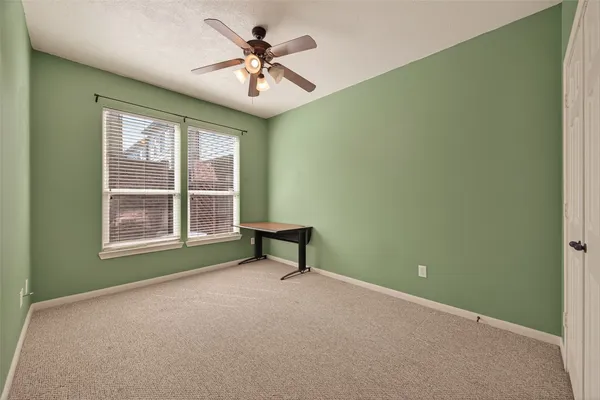 a furnished livingroom with a window