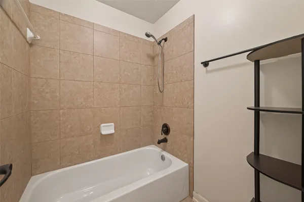 a bathroom with a bathtub