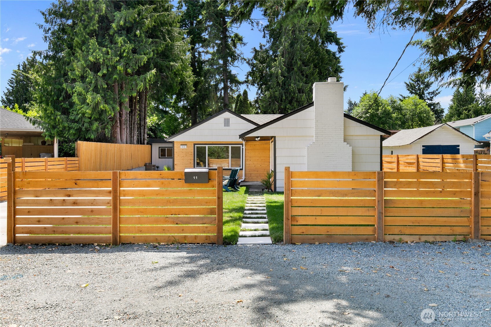 11 Southwest 100th Street Seattle, WA 98146 - Photo 1 of 36 a view of a house with a backyard