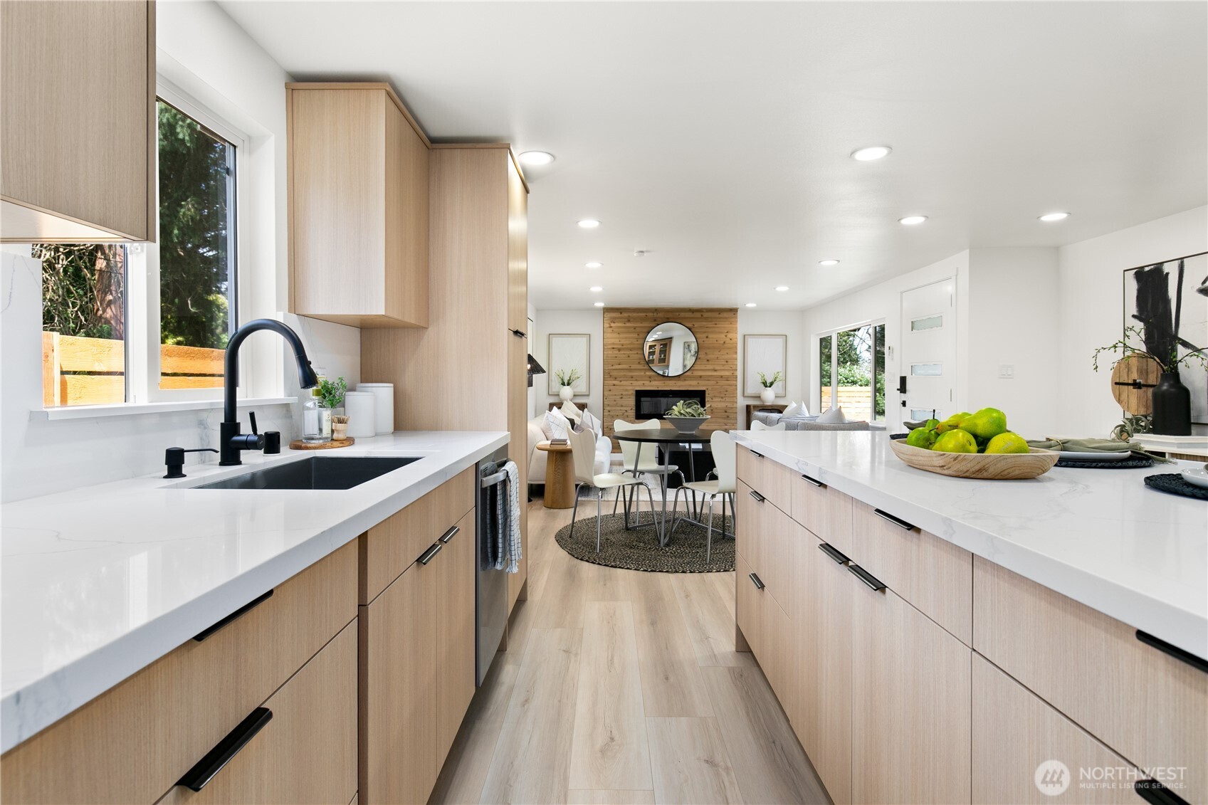 11 Southwest 100th Street Seattle, WA 98146 - Photo 13 of 36 a kitchen with a sink appliances and cabinets