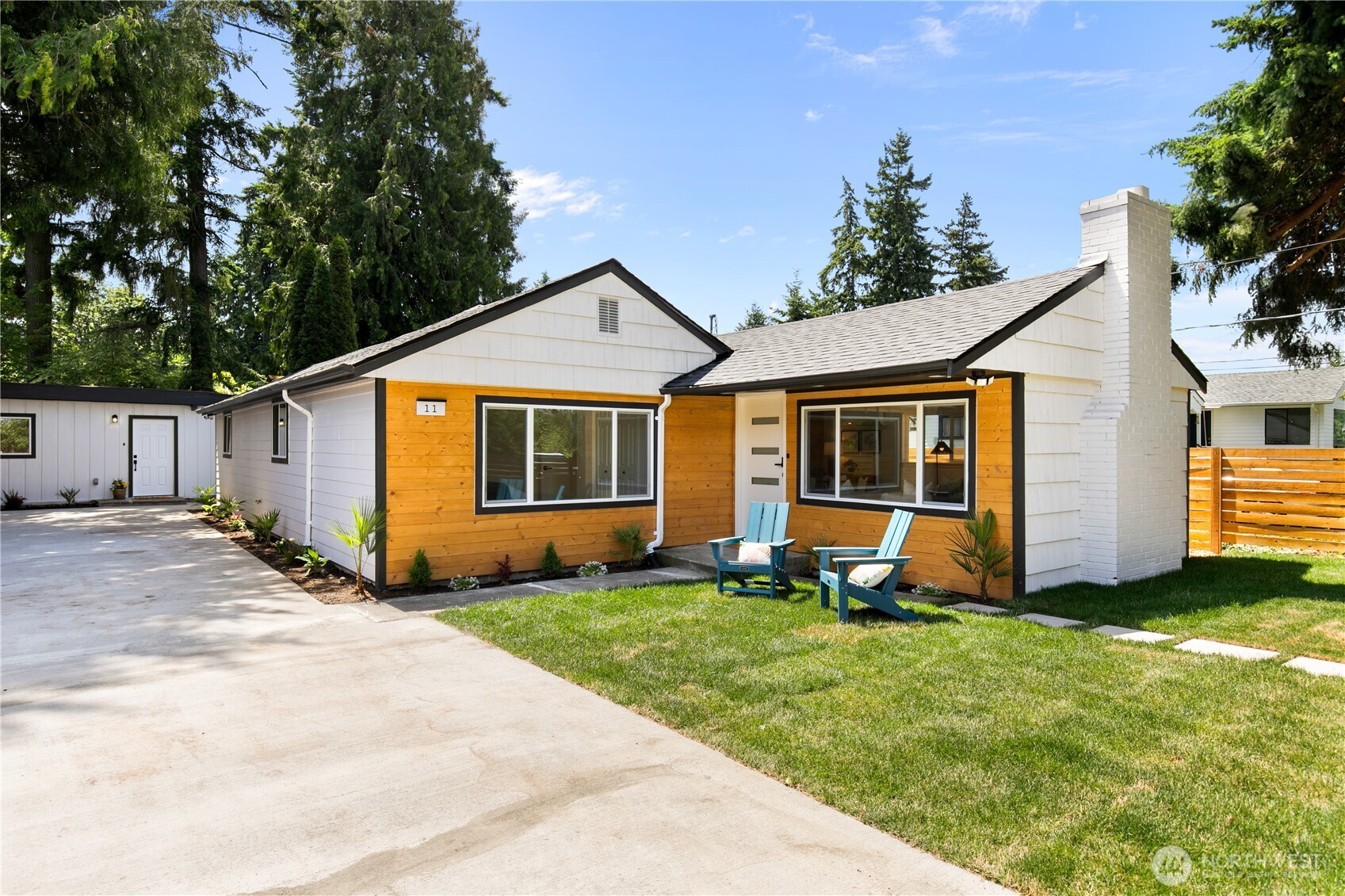 11 Southwest 100th Street Seattle, WA 98146 - Photo 2 of 36 a view of a house with a yard and sitting area