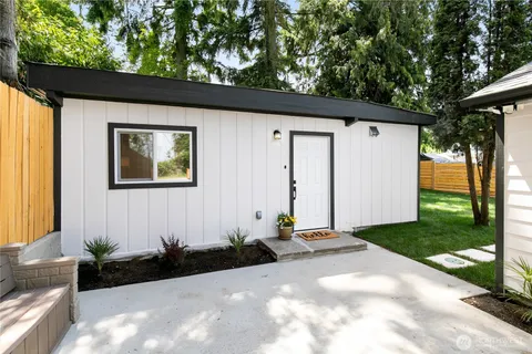 a backyard of a house with lots of green space