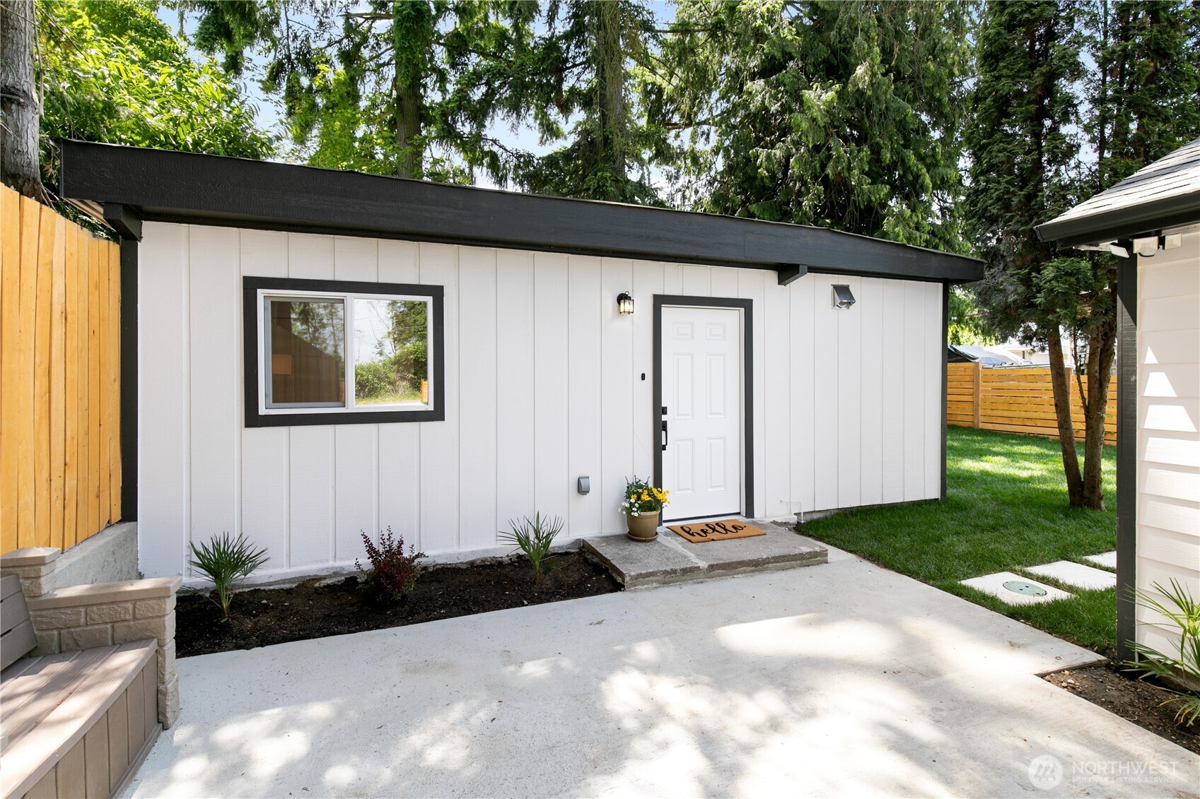 11 Southwest 100th Street Seattle, WA 98146 - Photo 23 of 36 a backyard of a house with lots of green space