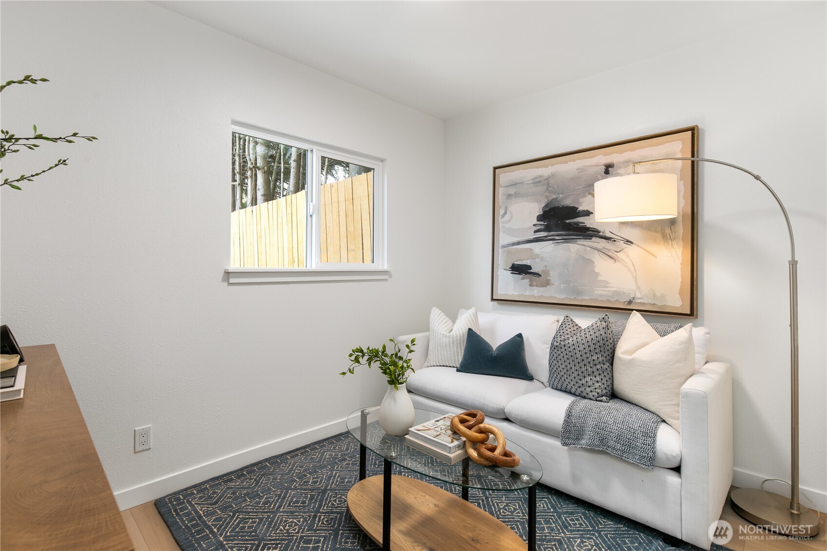 11 Southwest 100th Street Seattle, WA 98146 - Photo 27 of 36 a living room with furniture and a window