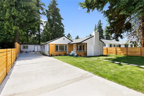 a front view of a house with yard