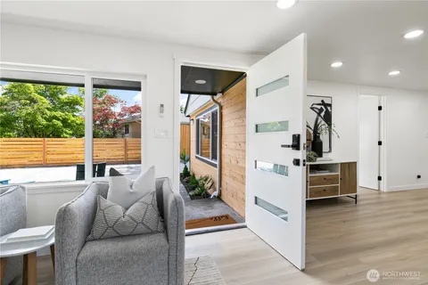 a living room with furniture and windows