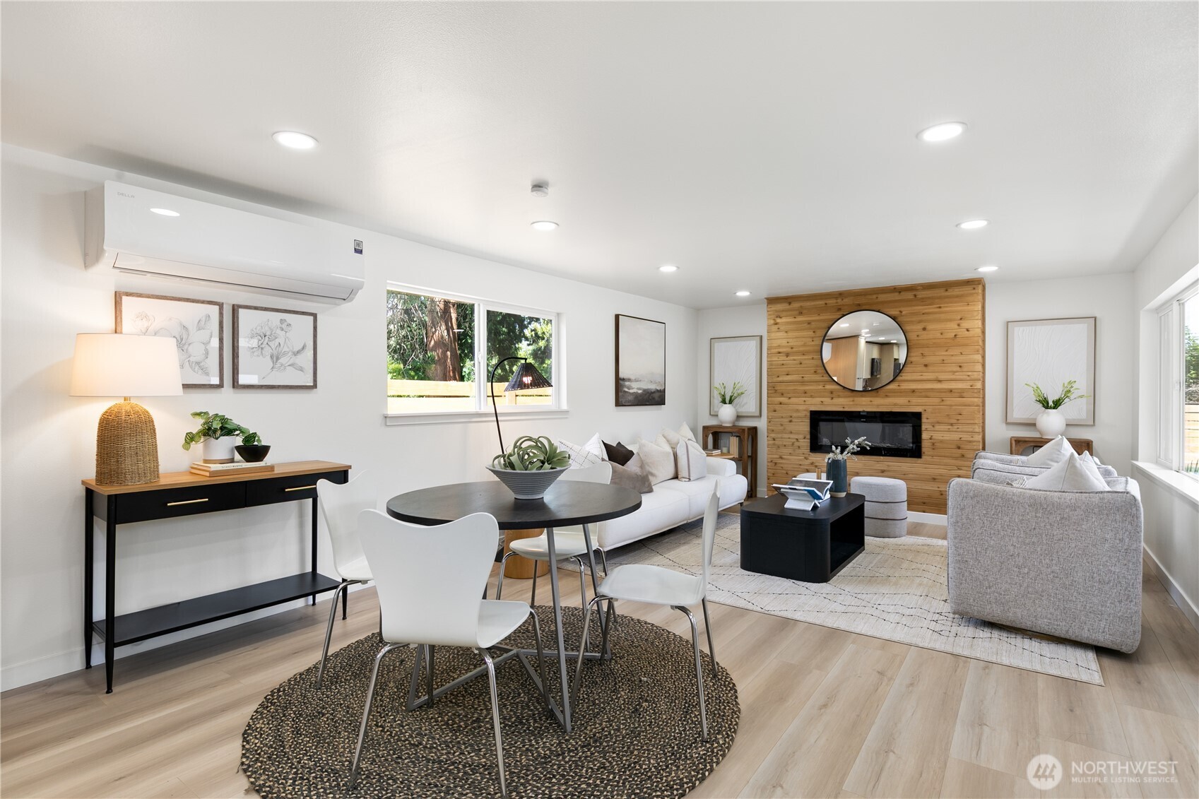 11 Southwest 100th Street Seattle, WA 98146 - Photo 9 of 36 a living room with fireplace furniture and a wooden floor