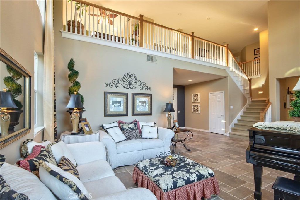 32815 Cleveland Street Temecula, CA 92592 - Photo 12 of 71 a living room with furniture and a flat screen tv