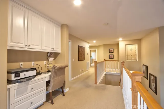 a spacious bathroom with a double vanity sink mirror and shower