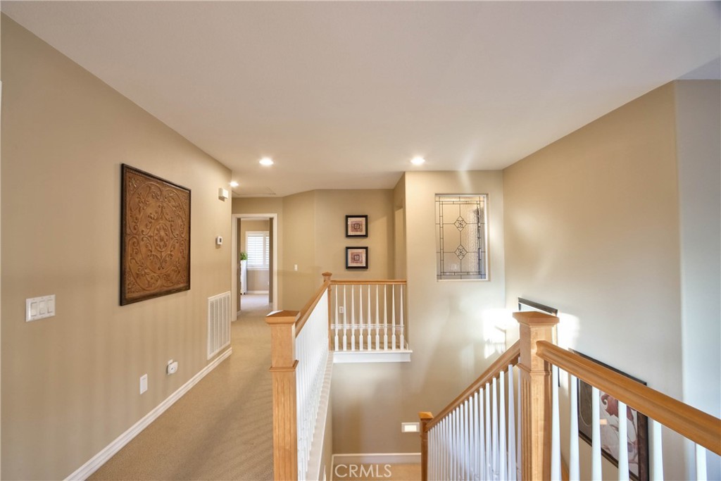 32815 Cleveland Street Temecula, CA 92592 - Photo 32 of 71 a view of a hallway with a living room
