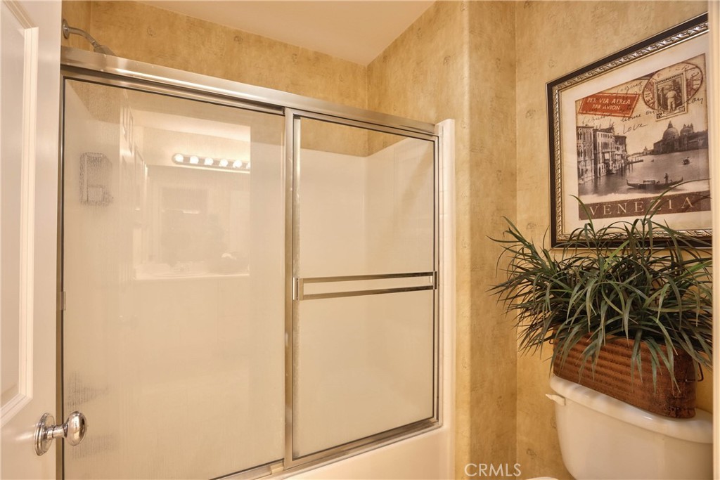 32815 Cleveland Street Temecula, CA 92592 - Photo 39 of 71 a white toilet sitting next to a bathroom sink