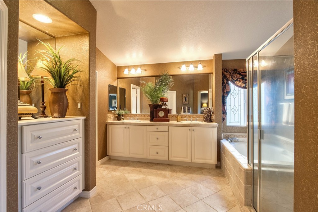 32815 Cleveland Street Temecula, CA 92592 - Photo 43 of 71 a kitchen with stainless steel appliances granite countertop a refrigerator and a sink