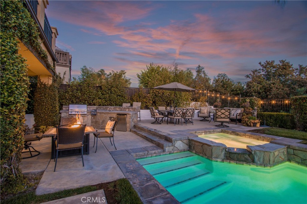 32815 Cleveland Street Temecula, CA 92592 - Photo 68 of 71 a view of a swimming pool with chairs in patio