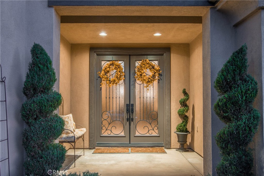 32815 Cleveland Street Temecula, CA 92592 - Photo 70 of 71 a front view of two house with potted plants