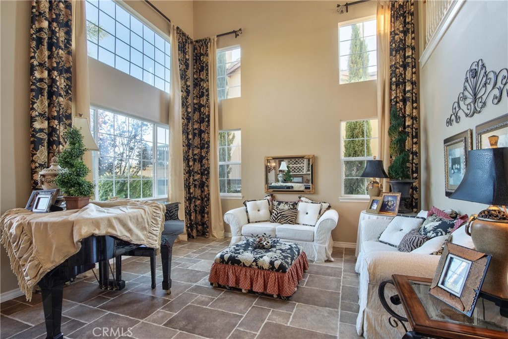 32815 Cleveland Street Temecula, CA 92592 - Photo 9 of 71 a living room with furniture and a large window