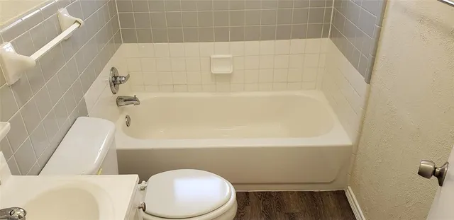a bathroom with a sink and bathtub