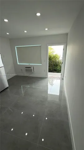 a view of a livingroom with a staircase