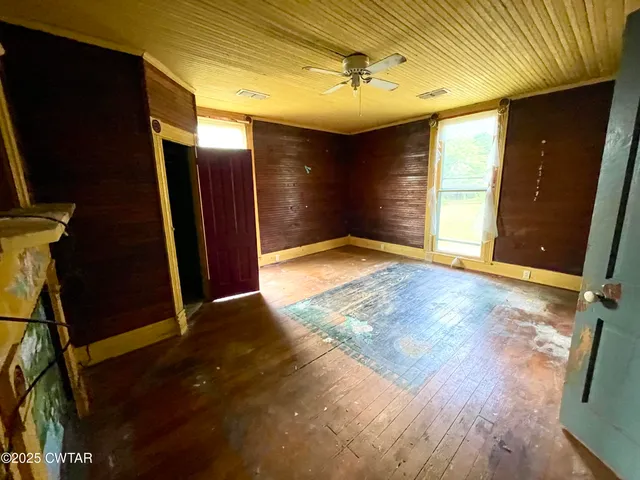 a bathroom with a toilet sink and a mirror