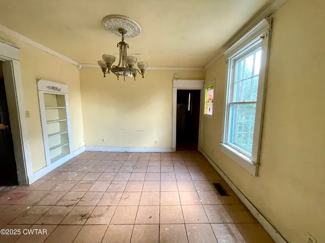 a very nice looking room with a chandelier