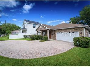 2707 Kilgore Street Orlando, FL 32803 - Photo 2 of 9 a view of a house with a yard and potted plants