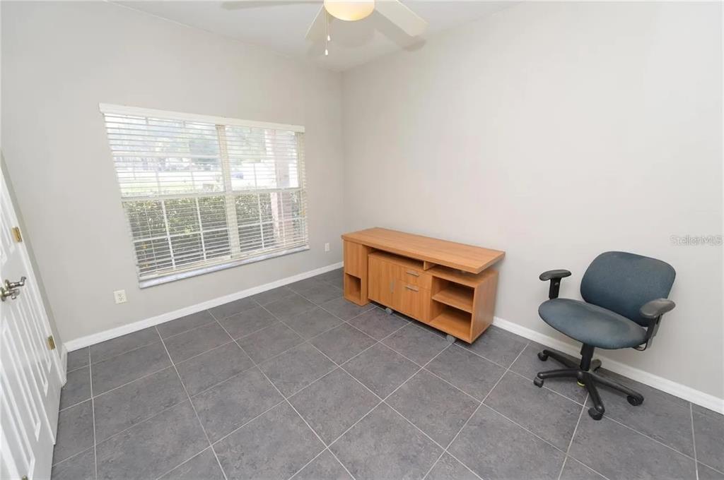 2707 Kilgore Street Orlando, FL 32803 - Photo 8 of 9 a living room with furniture and a window