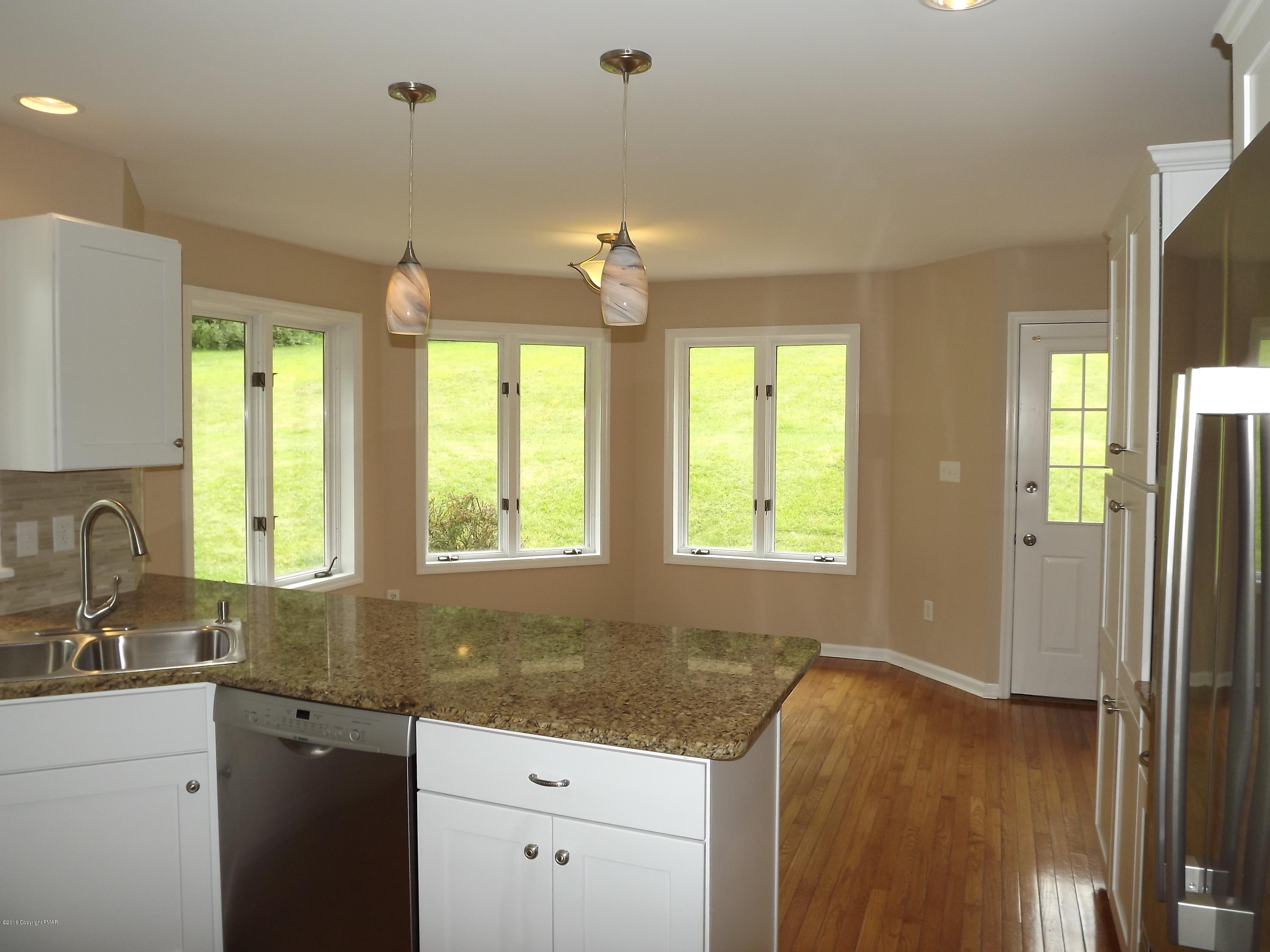 2111 Fox Run Road Stroudsburg, PA 18360 - Photo 20 of 72 a kitchen with a sink and a window