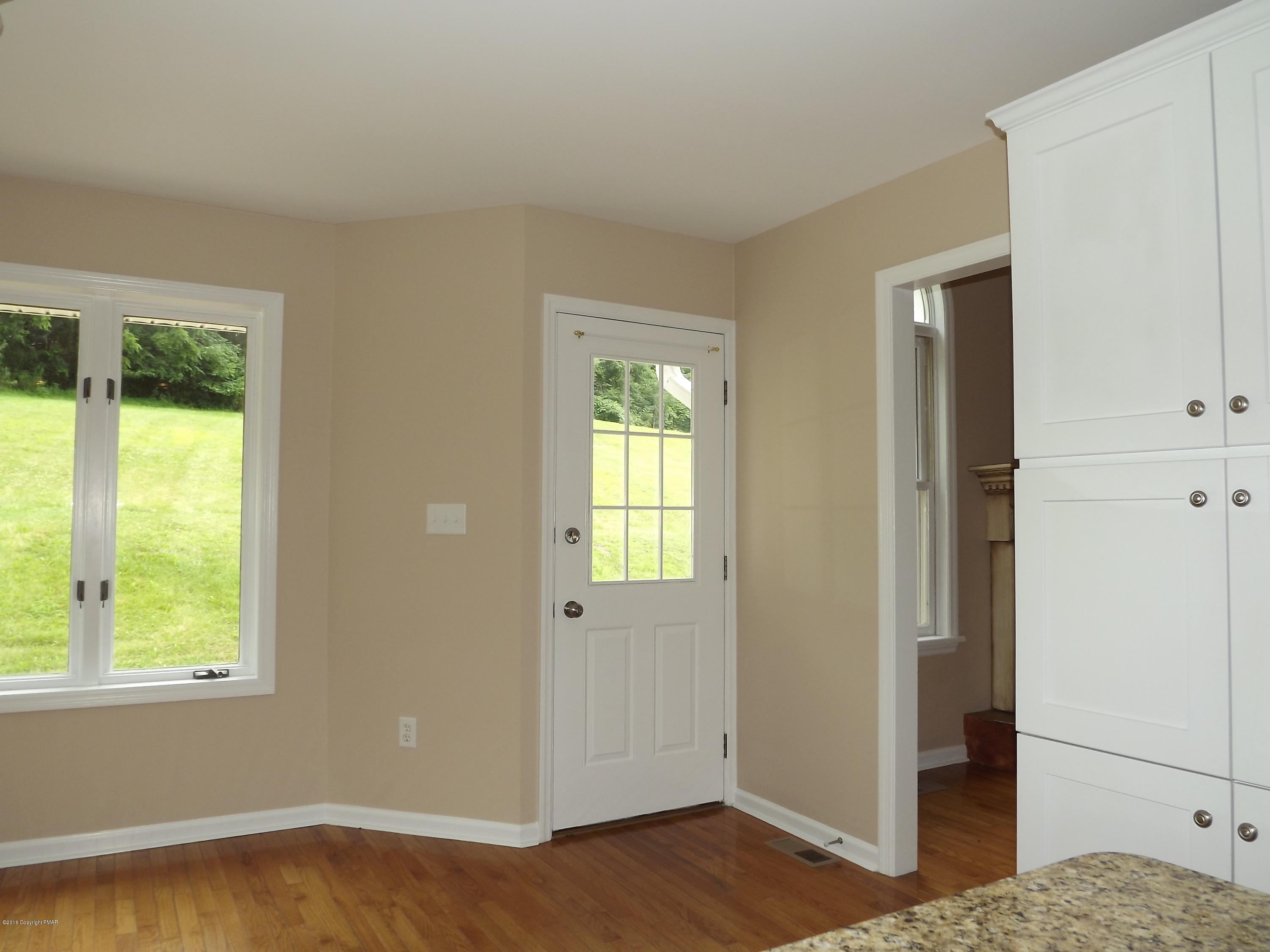 2111 Fox Run Road Stroudsburg, PA 18360 - Photo 29 of 72 a view of bedroom with window and wooden floor