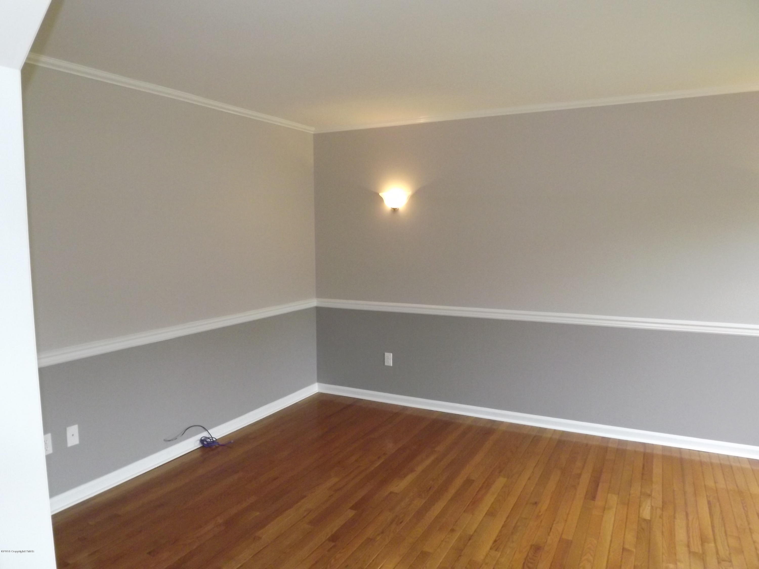 2111 Fox Run Road Stroudsburg, PA 18360 - Photo 36 of 72 a view of an empty room with wooden floor