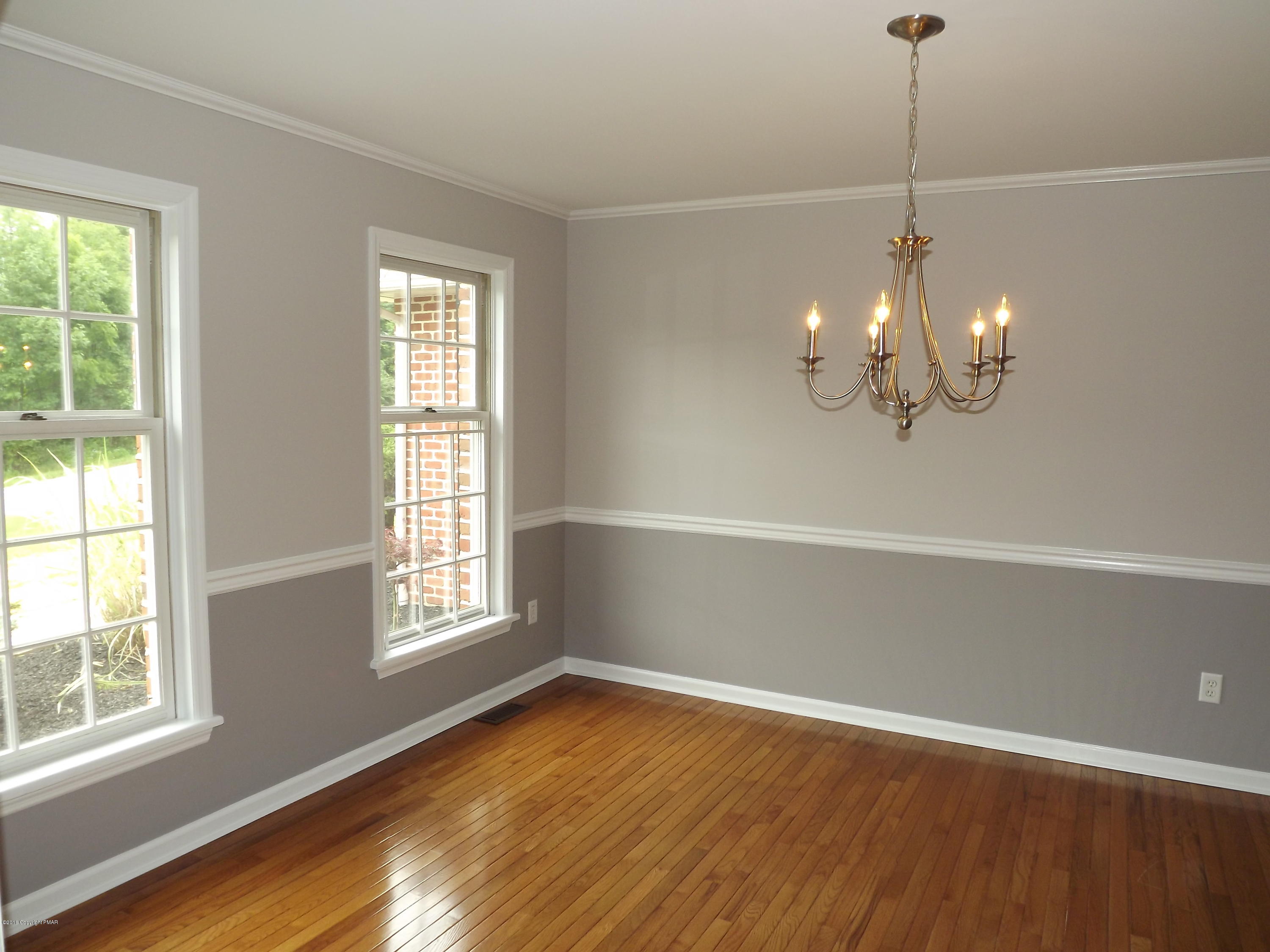 2111 Fox Run Road Stroudsburg, PA 18360 - Photo 41 of 72 a view of empty room with wooden floor and fan