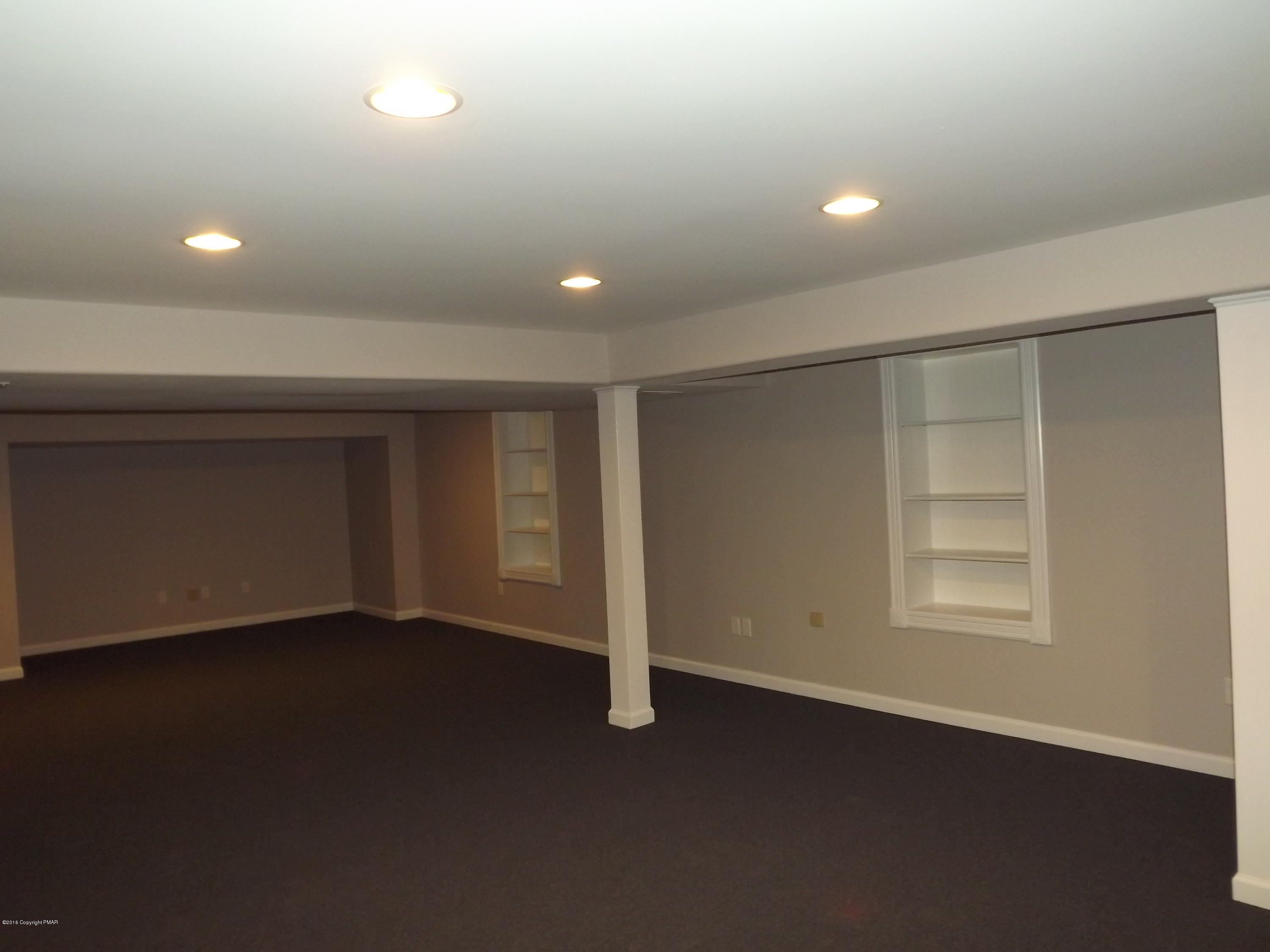 2111 Fox Run Road Stroudsburg, PA 18360 - Photo 65 of 72 an empty room with windows