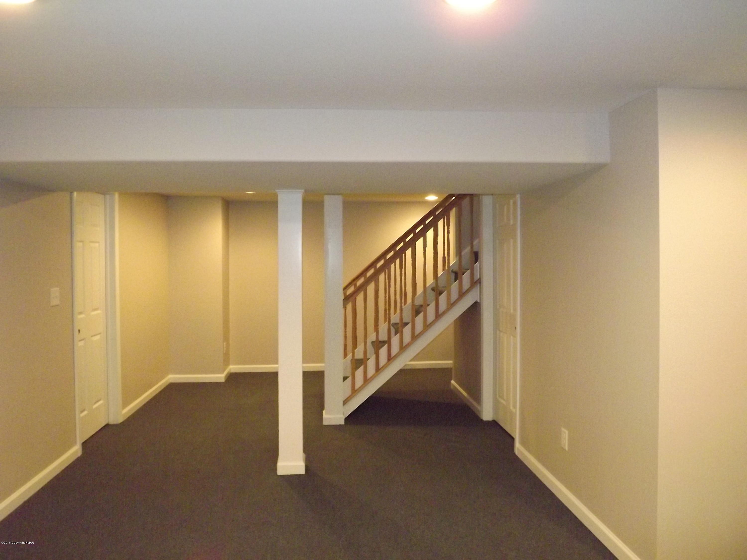 2111 Fox Run Road Stroudsburg, PA 18360 - Photo 67 of 72 a view of an entryway with staircase